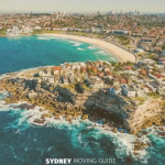 Aerial view of Bondi Beach with Sydney's CBD in the background.