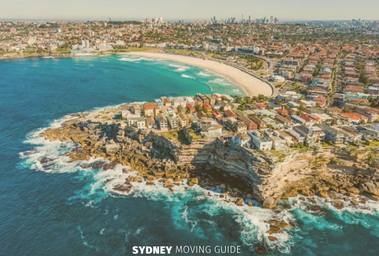 Aerial view of Bondi Beach with Sydney's CBD in the background.